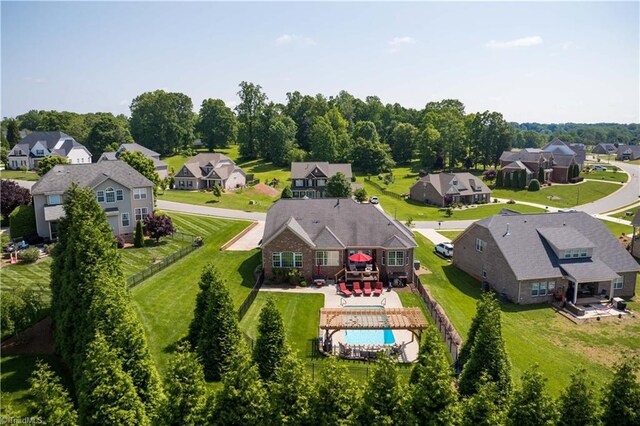 aerial view of residential area featuring a pool