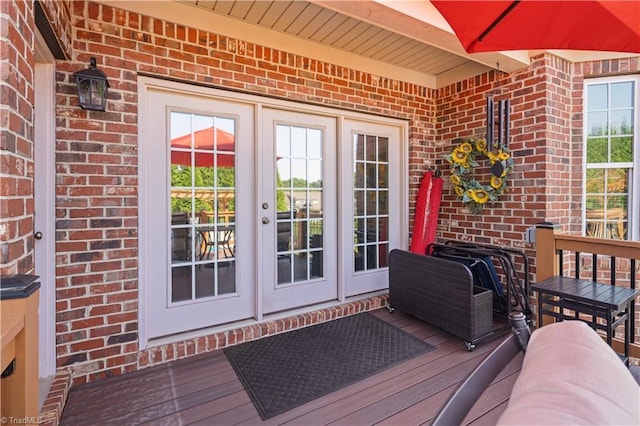 wooden terrace featuring french doors