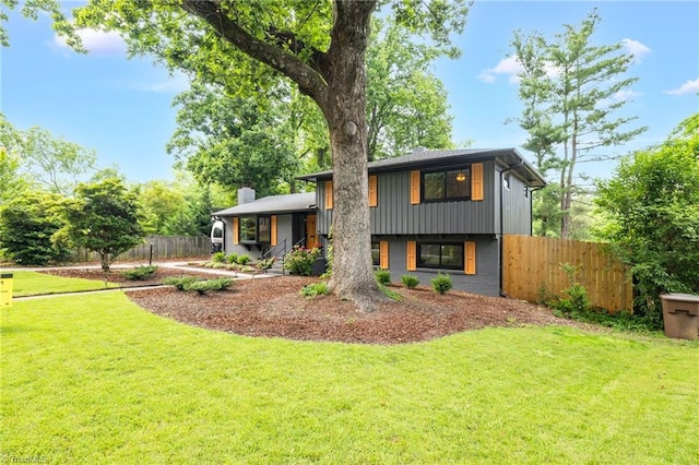 1508 Lafayette Ct, Greensboro, NC 27408 - tri-level home featuring a chimney