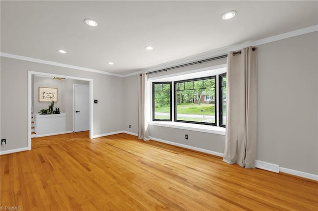 1508 Lafayette Ct, Greensboro, NC 27408 - spare room with crown molding, baseboards, recessed lighting, and light wood-style flooring