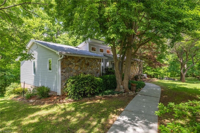 1134 Edwards Farm Rd, King, NC 27021 - view of property exterior featuring stone siding and a lawn
