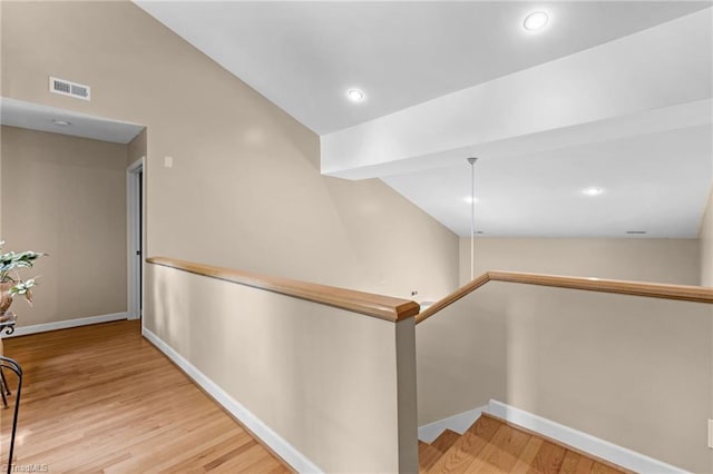 1134 Edwards Farm Rd, King, NC 27021 - corridor featuring vaulted ceiling, an upstairs landing, wood finished floors, baseboards, and recessed lighting