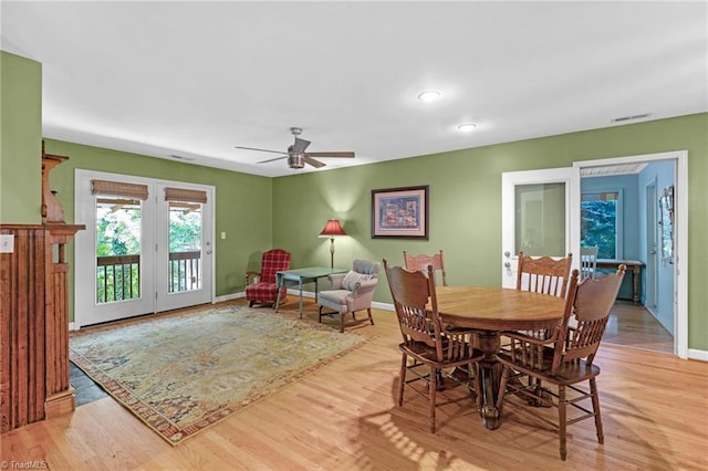 1134 Edwards Farm Rd, King, NC 27021 - dining space featuring light wood-type flooring, a ceiling fan, baseboards, and french doors