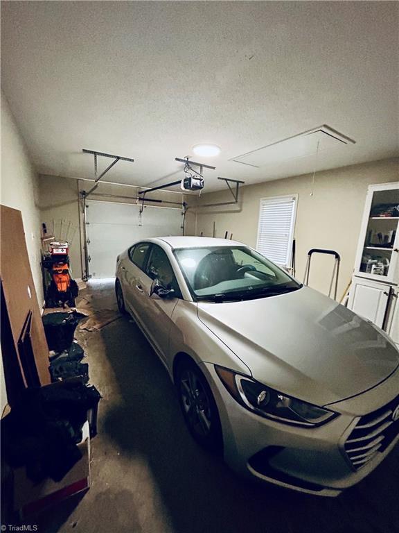 garage with a garage door opener