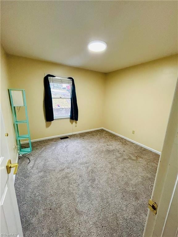 spare room with carpet