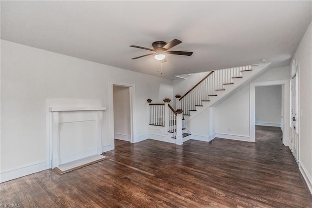 unfurnished living room with ceiling fan and dark hardwood / wood-style floors