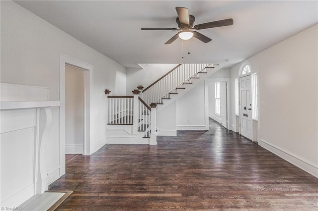 foyer entrance featuring dark hardwood / wood-style floors and ceiling fan