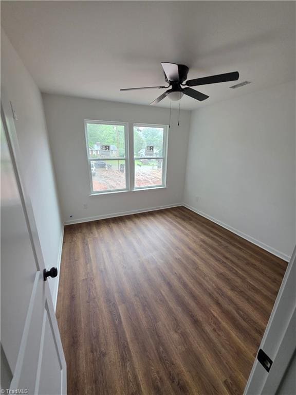 2647 Reid St, Winston-Salem, NC 27107 - unfurnished room with wood finished floors and ceiling fan