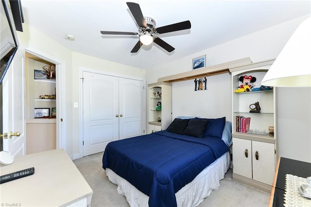 226 Marshview Cir, Angier, NC 27501 - bedroom with light colored carpet, a ceiling fan, and a closet