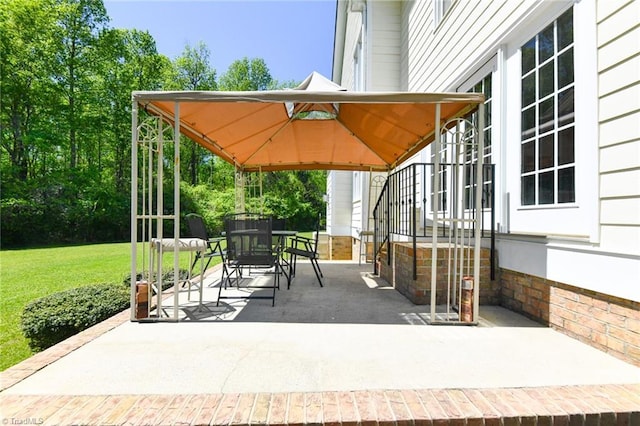 226 Marshview Cir, Angier, NC 27501 - view of patio / terrace featuring a gazebo and outdoor dining space