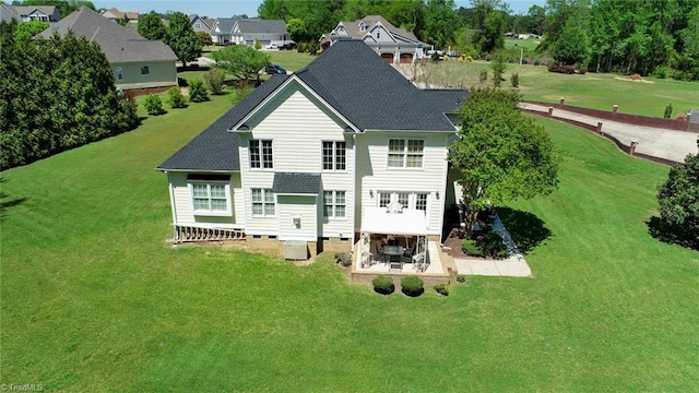 226 Marshview Cir, Angier, NC 27501 - rear view of property with roof with shingles, a yard, and a patio