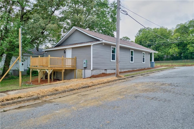 exterior space with a wooden deck