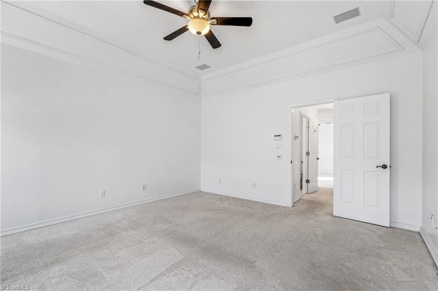 empty room with light carpet and ceiling fan