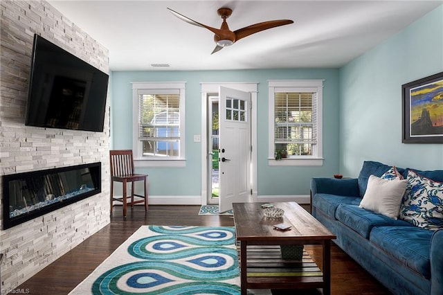 26 Vintage Ave, Winston-Salem, NC 27127 - living area featuring visible vents, wood finished floors, ceiling fan, and a stone fireplace