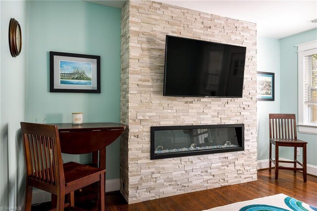 26 Vintage Ave, Winston-Salem, NC 27127 - living room featuring visible vents, baseboards, and wood finished floors
