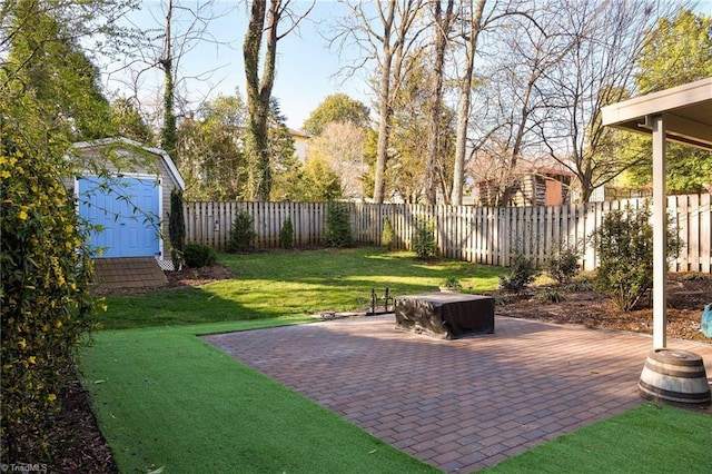 26 Vintage Ave, Winston-Salem, NC 27127 - view of yard with a patio area, a fenced backyard, an outdoor structure, and a shed