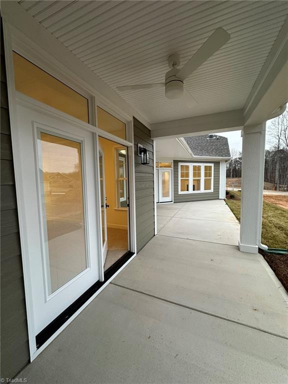 view of patio with a ceiling fan