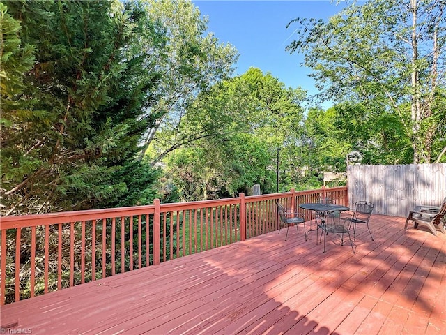 deck featuring outdoor dining area