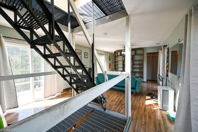 stairs with wood finished floors