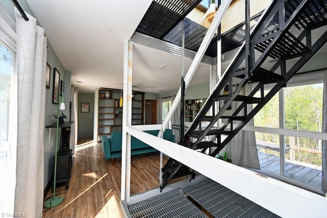 stairs with wood finished floors