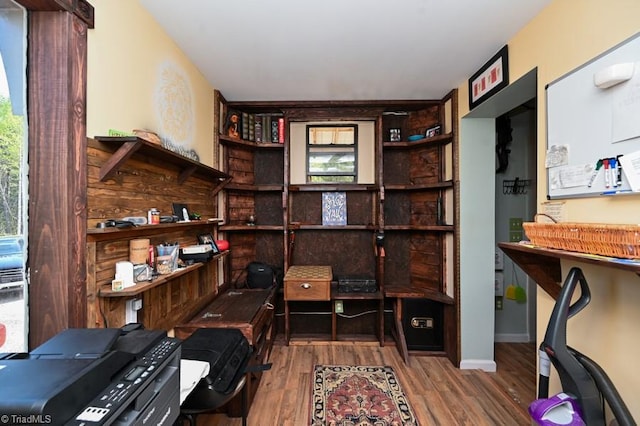 office space with wood finished floors