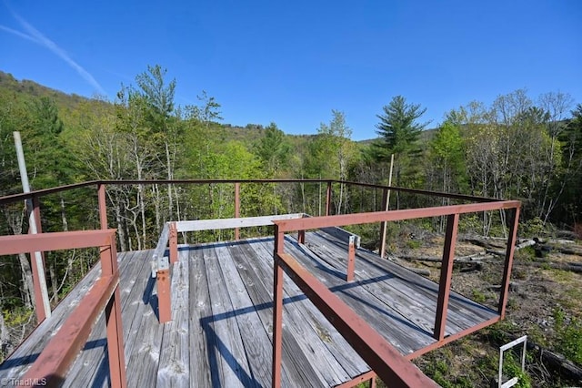 exterior space featuring a forest view