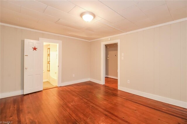 323 Anderson Rd, Eden, NC 27288 - unfurnished room featuring ornamental molding, baseboards, and wood finished floors