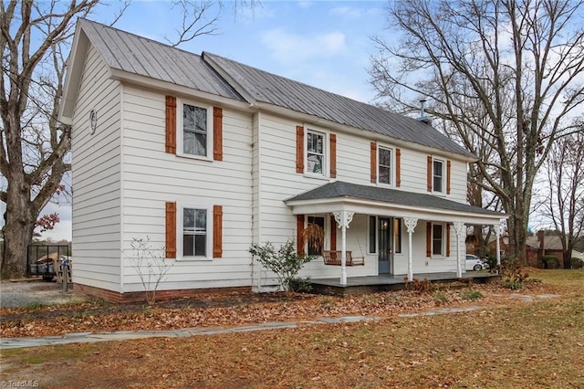 323 Anderson Rd, Eden, NC 27288 - view of front facade with metal roof and a porch