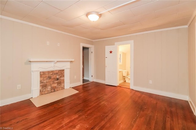 323 Anderson Rd, Eden, NC 27288 - unfurnished living room with baseboards, a fireplace, wood finished floors, and crown molding