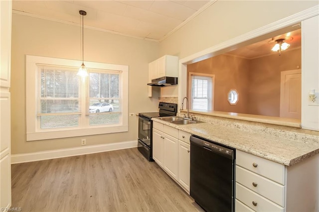 323 Anderson Rd, Eden, NC 27288 - kitchen featuring under cabinet range hood, black appliances, ornamental molding, and a sink