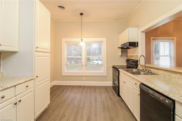 323 Anderson Rd, Eden, NC 27288 - kitchen with visible vents, a sink, black appliances, under cabinet range hood, and white cabinetry