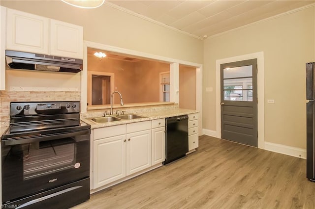 323 Anderson Rd, Eden, NC 27288 - kitchen with black appliances, ornamental molding, under cabinet range hood, a sink, and white cabinets
