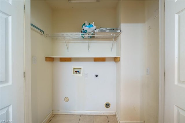 laundry room featuring hookup for a washing machine, hookup for a gas dryer, hookup for an electric dryer, laundry area, and tile patterned floors