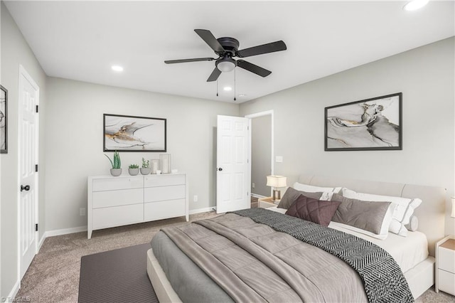 bedroom with ceiling fan and carpet floors