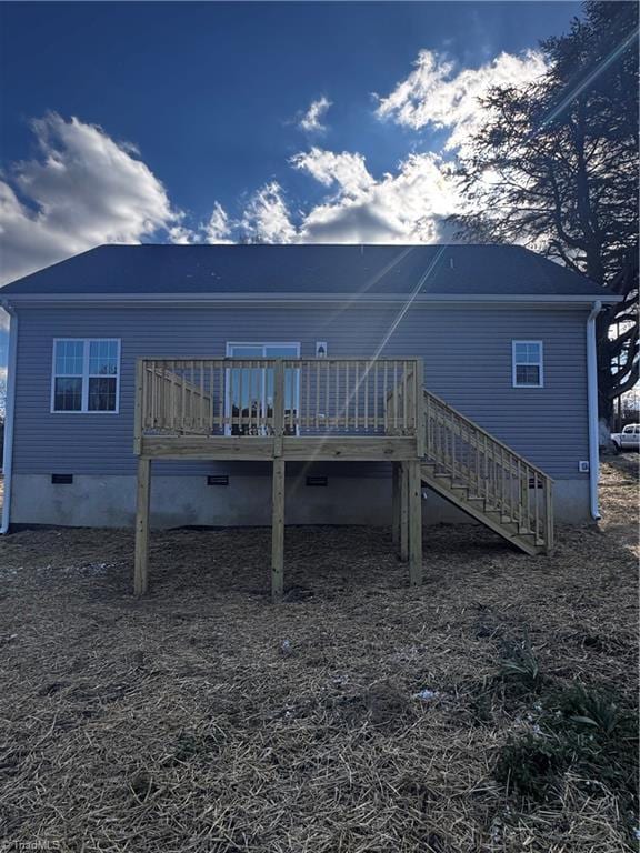 rear view of house with a deck