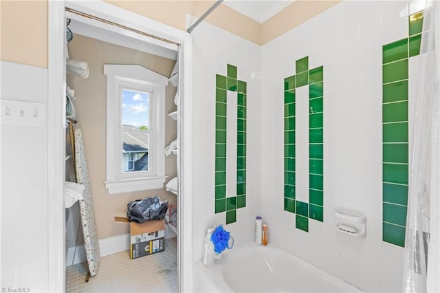full bathroom with a tub