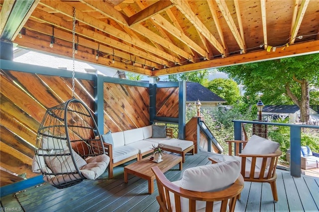wooden terrace featuring an outdoor hangout area