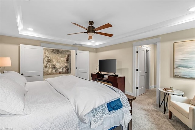 7733 Michaelis St, Greensboro, NC 27455 - bedroom featuring a tray ceiling, light carpet, baseboards, recessed lighting, and a ceiling fan