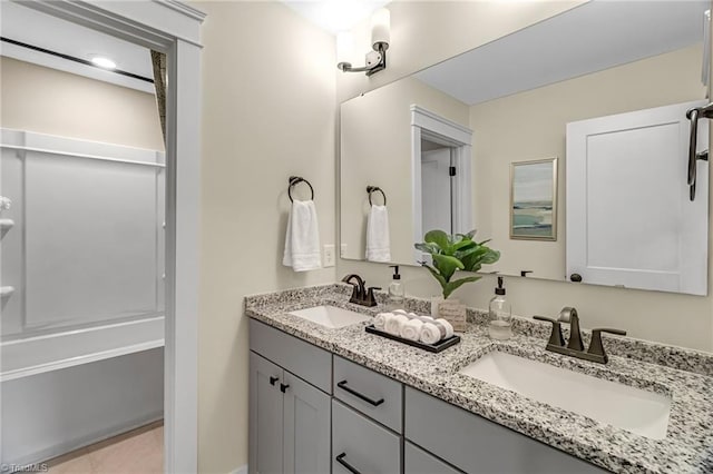7733 Michaelis St, Greensboro, NC 27455 - full bath featuring double vanity and tile patterned floors