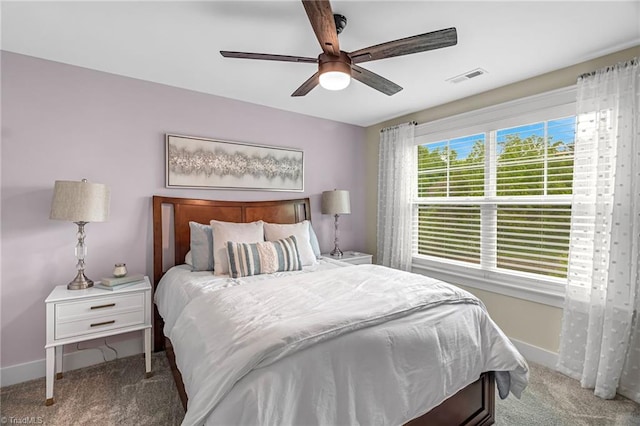 7733 Michaelis St, Greensboro, NC 27455 - bedroom with carpet, baseboards, and a ceiling fan