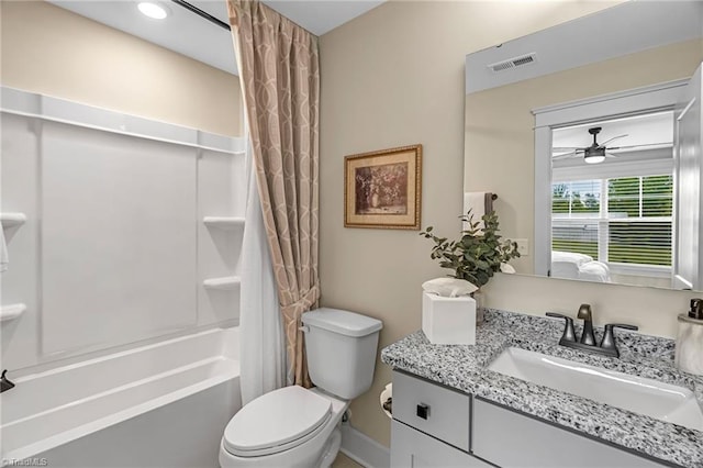 7733 Michaelis St, Greensboro, NC 27455 - full bath with vanity, shower / tub combo with curtain, toilet, a ceiling fan, and baseboards