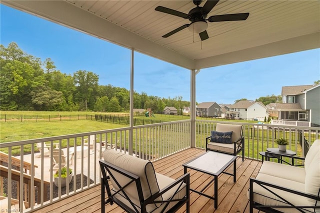 7733 Michaelis St, Greensboro, NC 27455 - wooden terrace featuring a ceiling fan, an outdoor hangout area, and a residential view
