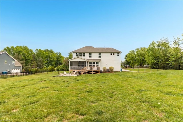 7733 Michaelis St, Greensboro, NC 27455 - back of property featuring a sunroom and a wooden deck