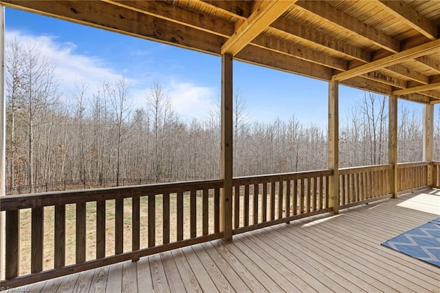 deck featuring a forest view