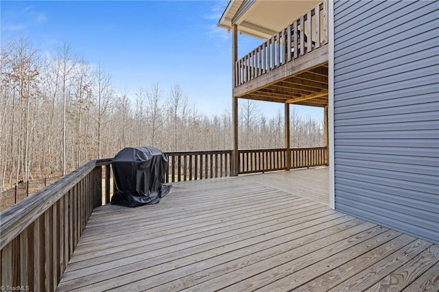 wooden deck with area for grilling