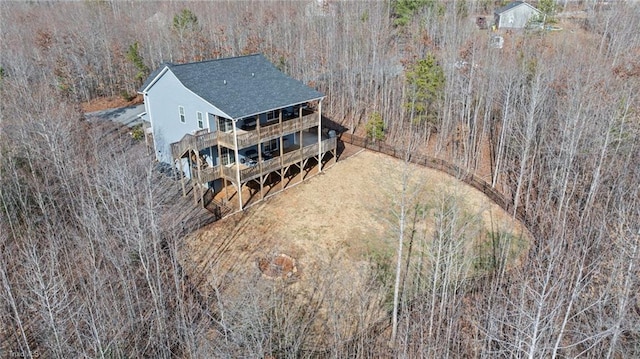 drone / aerial view with a view of trees