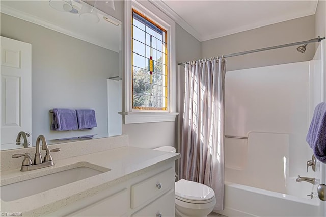 full bathroom featuring a wealth of natural light, toilet, vanity, and shower / bathtub combination with curtain