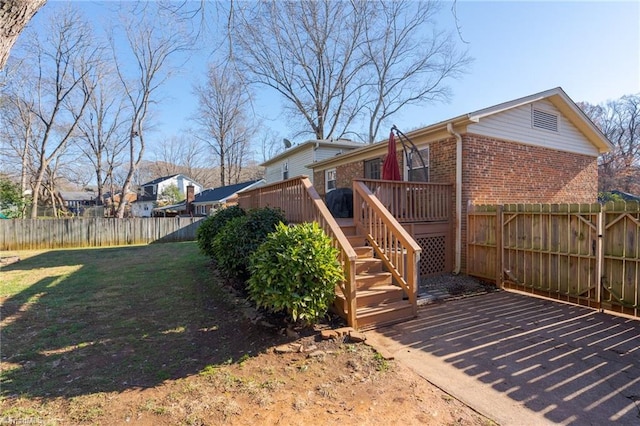 view of yard with a wooden deck