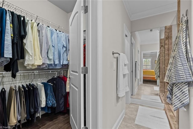 walk in closet featuring tile patterned floors