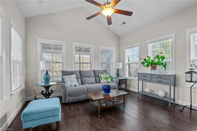 living room featuring dark hardwood / wood-style flooring, high vaulted ceiling, and ceiling fan